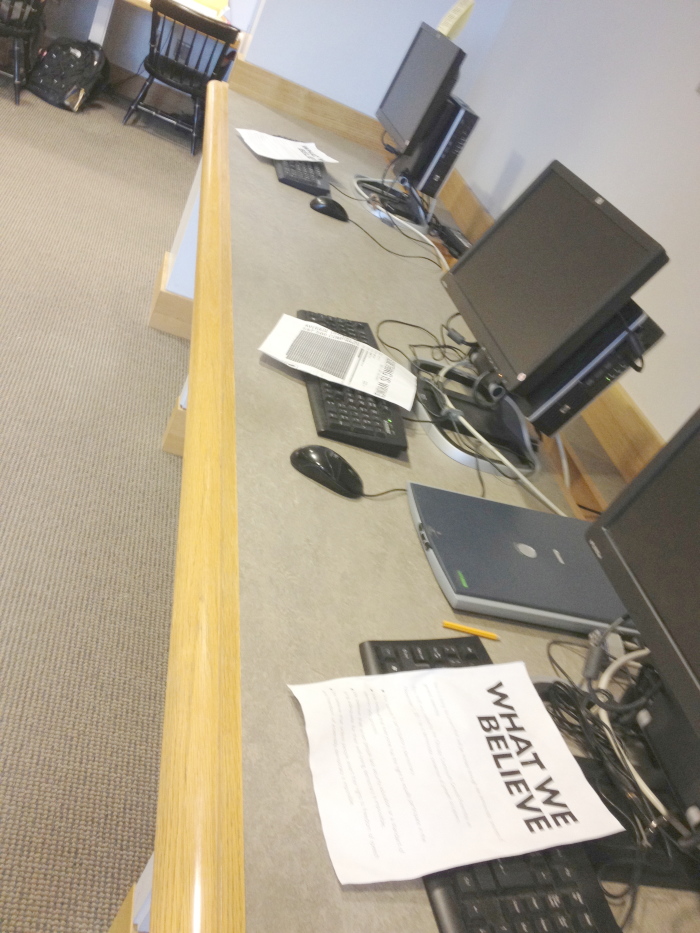 Occupy flyer at computer stations in the library_6432512005_o.jpg